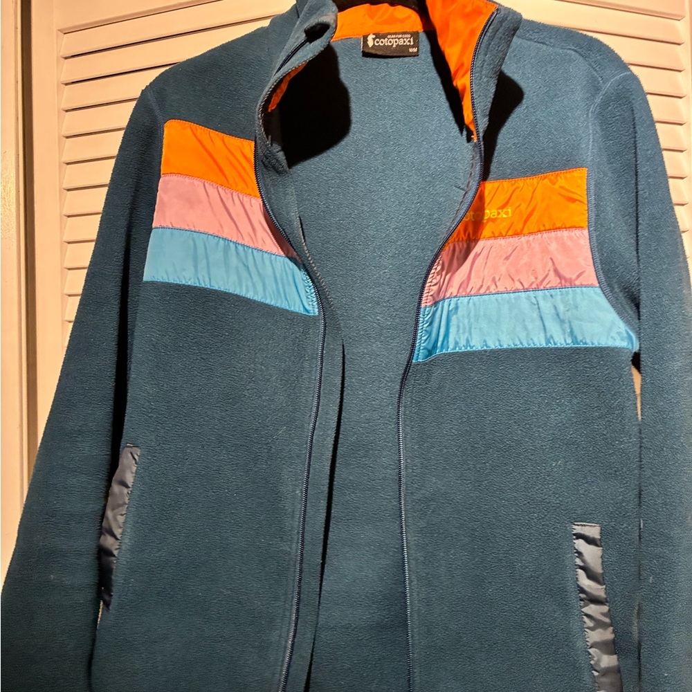 Cotopaxi Women's Jacket in Blue, Orange, and Pink